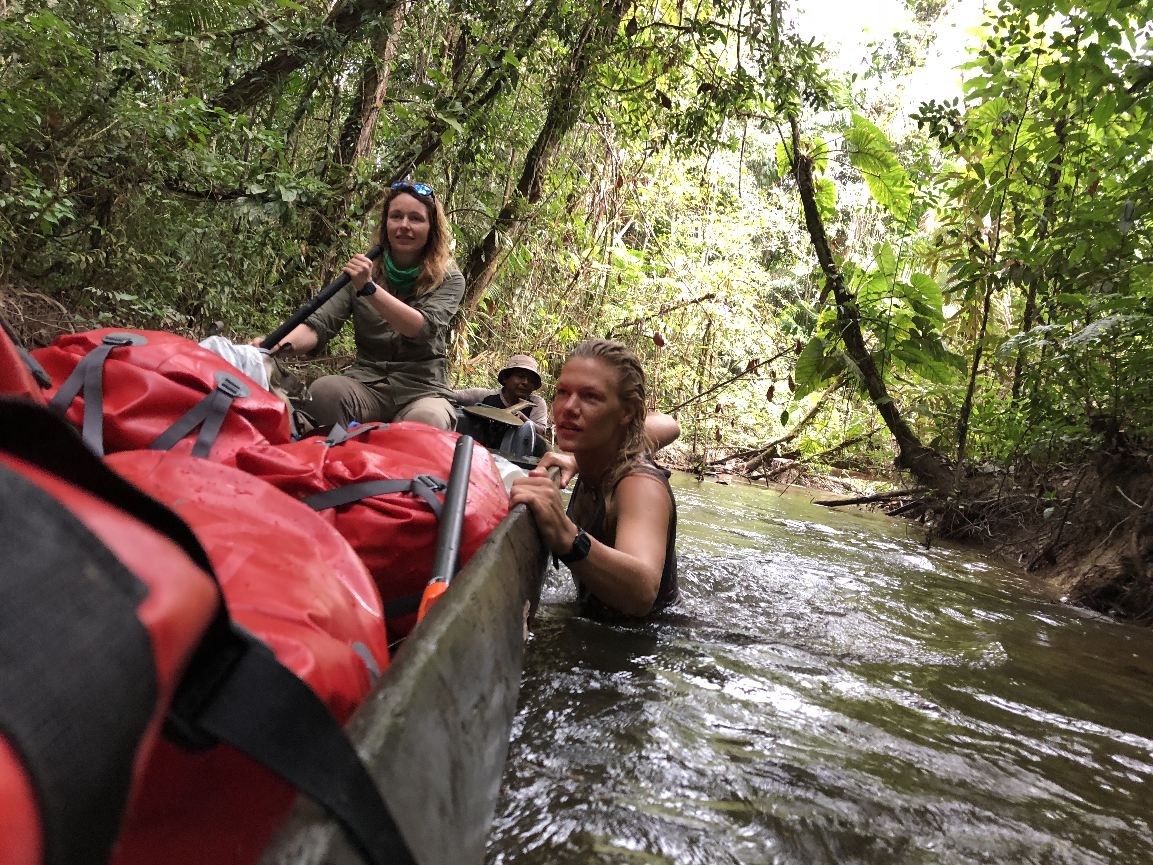 Pushing a wooden dug out during Essequibo river expedition