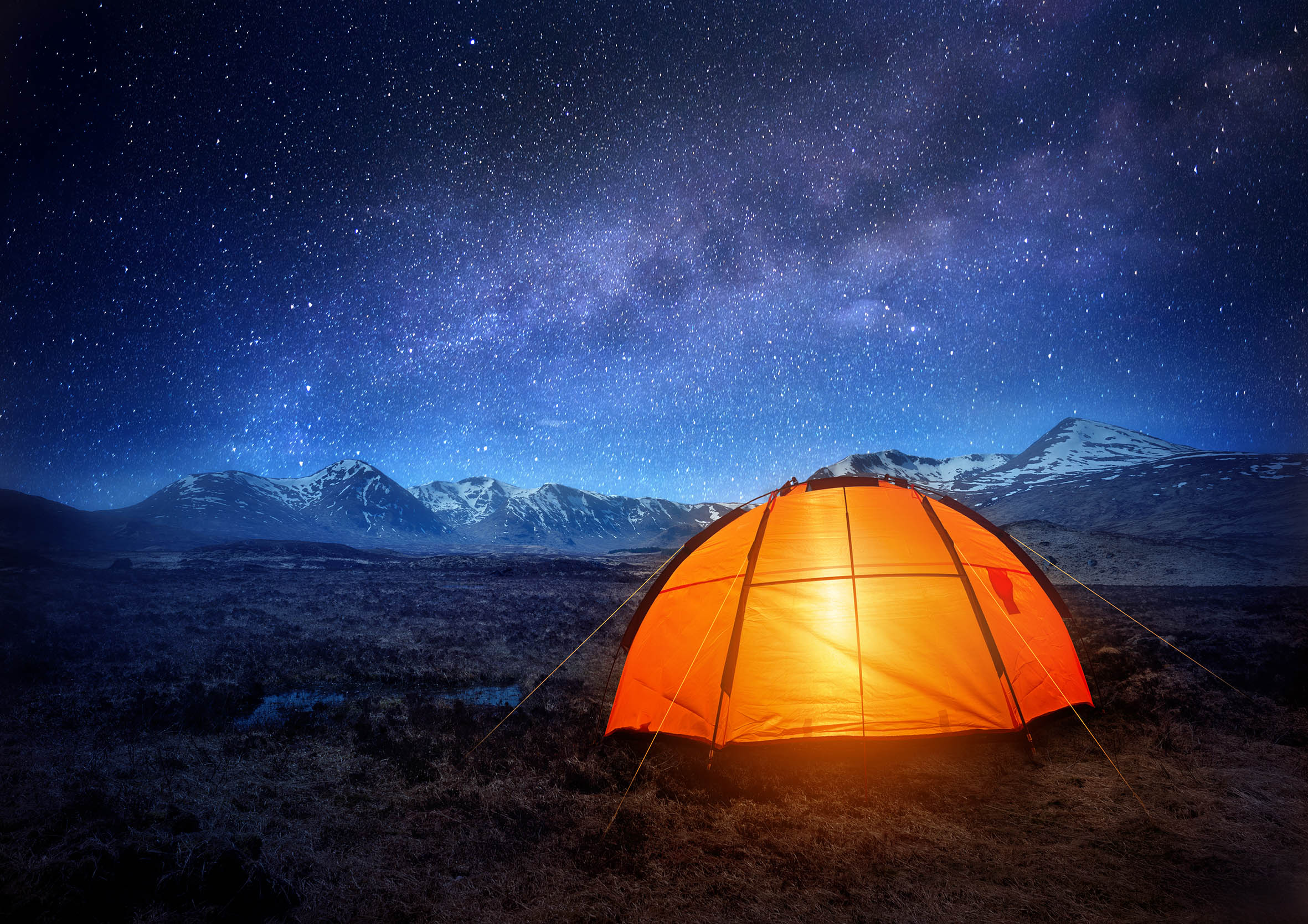 The sky at night during wild camping | Land Rover Explore